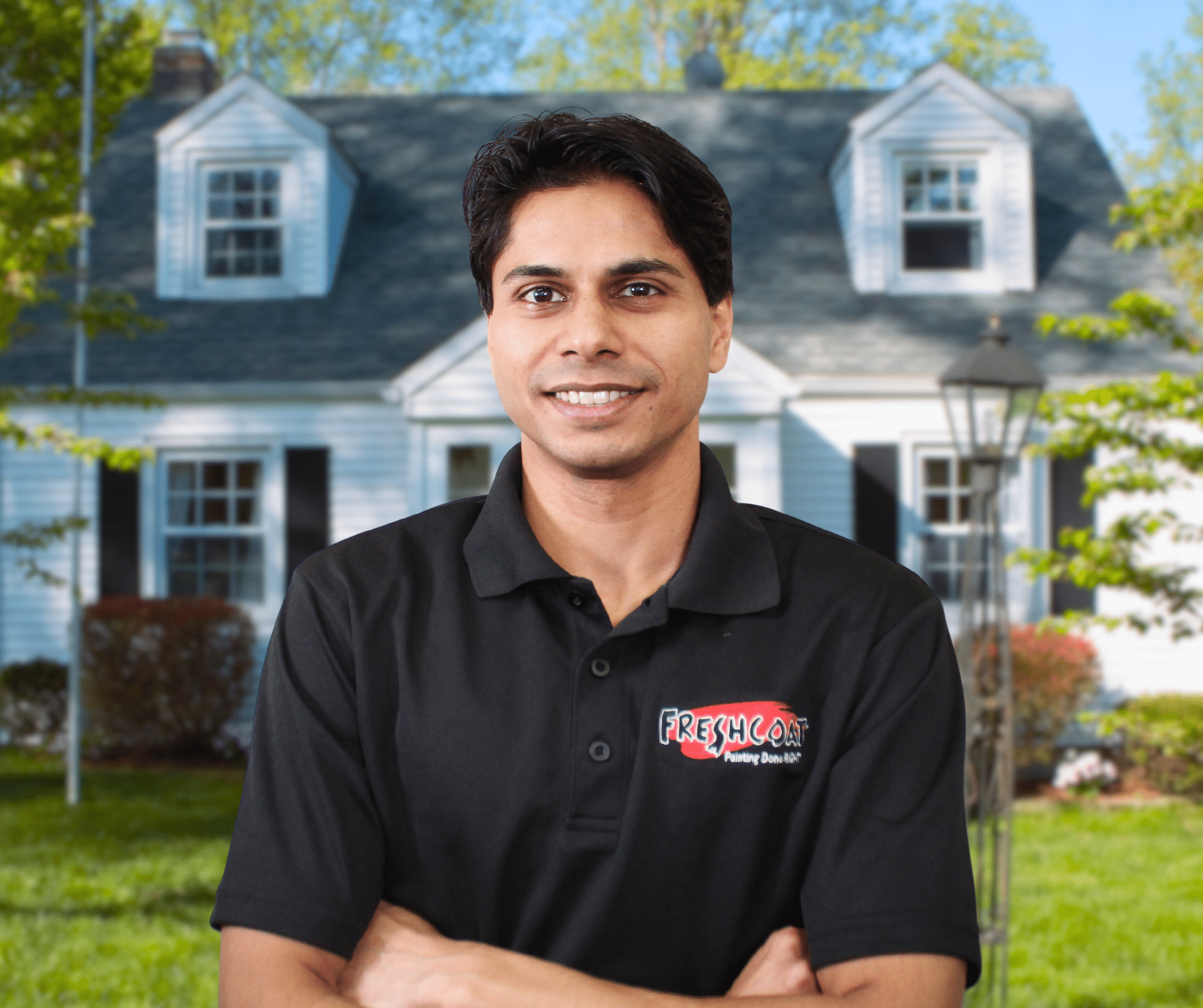 business owner standing in front of a house