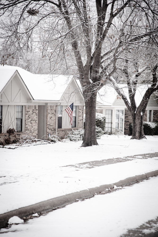 Sidewalk,View,Residential,Street,With,Proudly,Display,Of,American,Flag