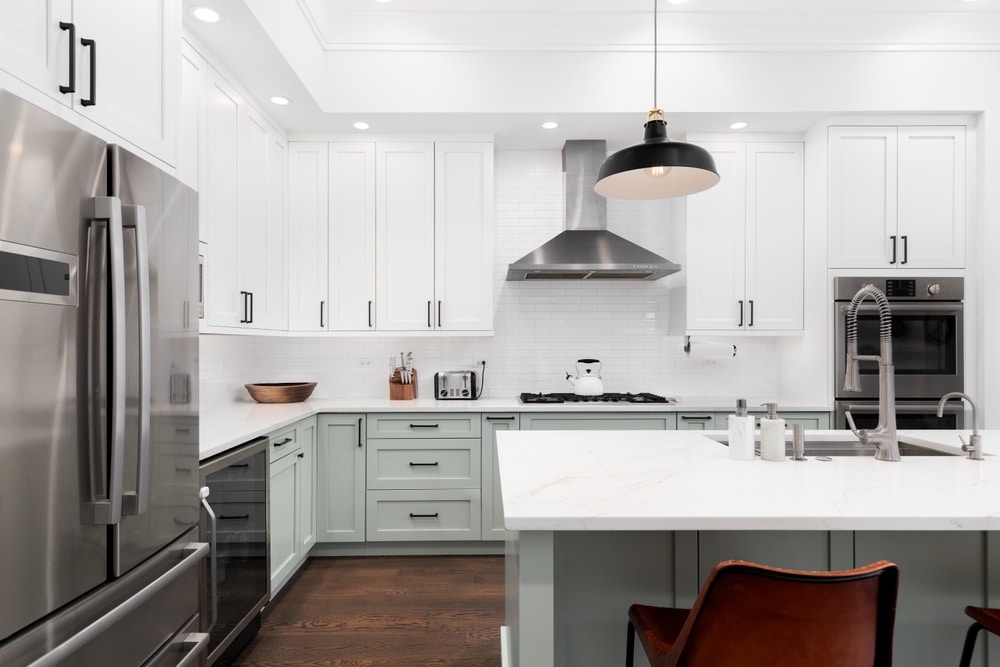 A,Kitchen,Detail,With,White,And,Sage,Green,Cabinets,,A