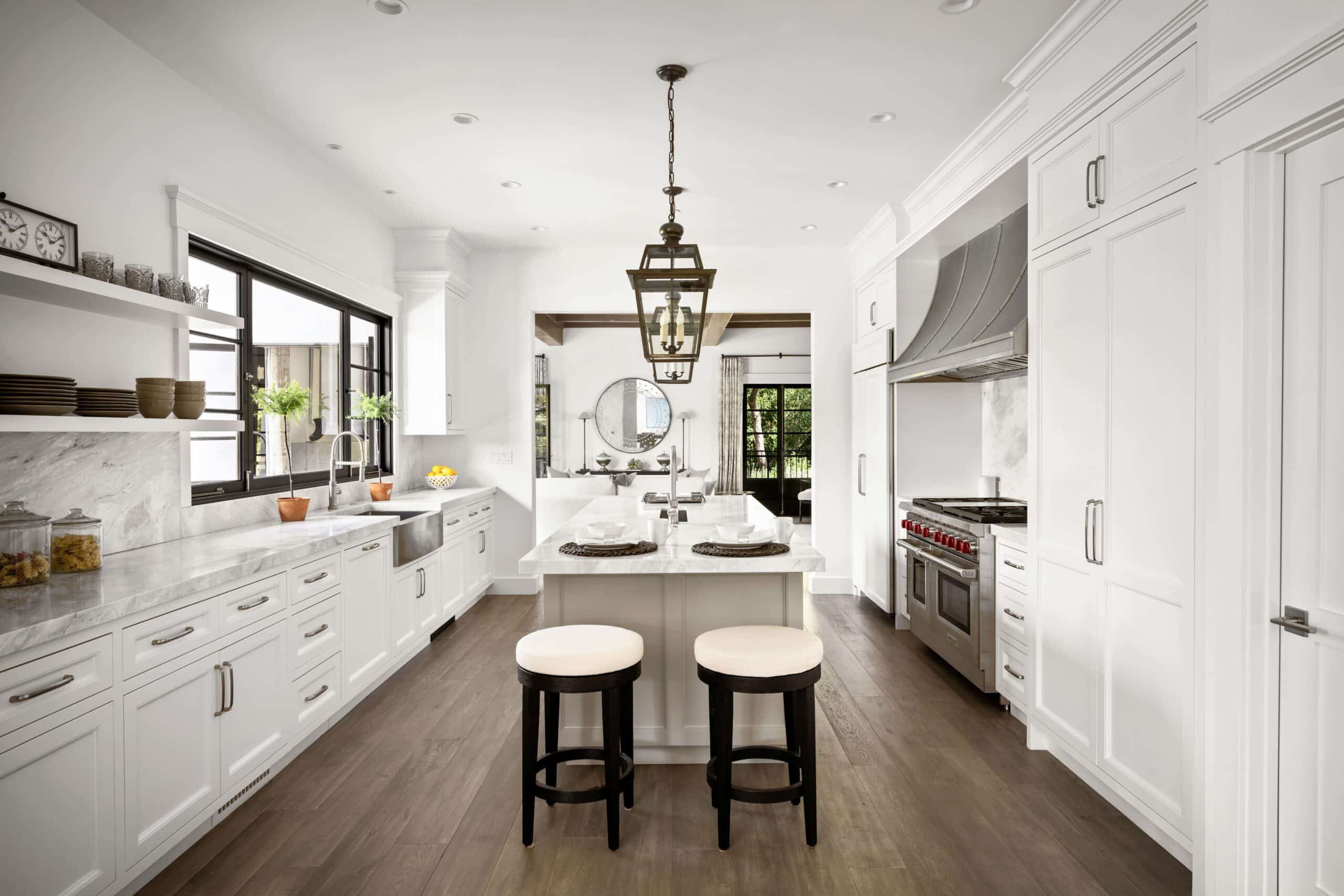 A,Modern,Kitchen,With,An,Island,Countertop,Featuring,Barstools,And